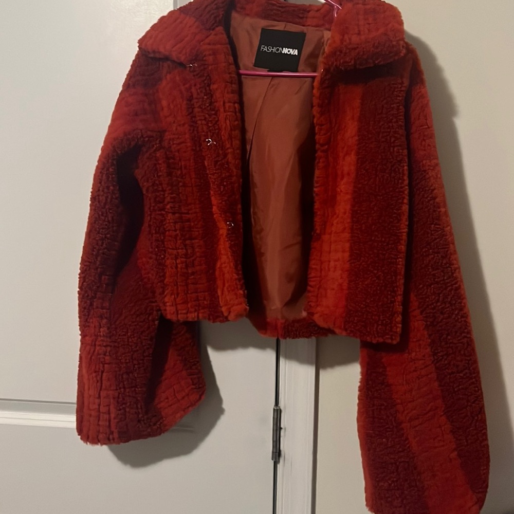 Red cropped jacket , Brand new tags just got taken off .